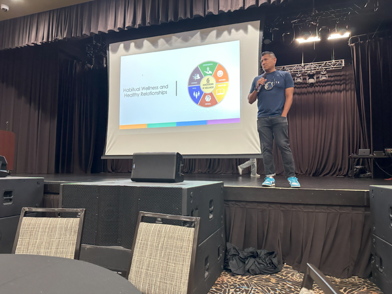 Chance Rush shares stories and encouragement during the Work Together Heal Together event.